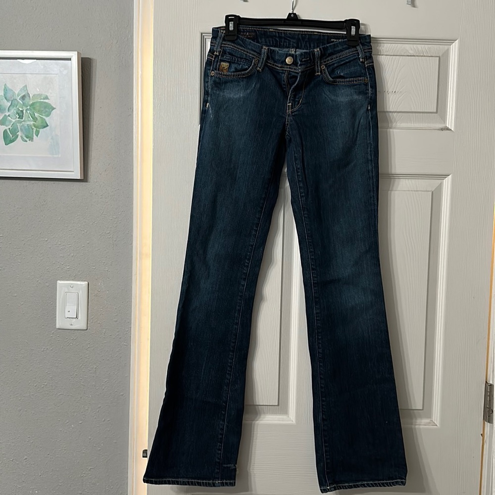 Citizens of Humanity Low stretch boot 27 slight tear back L leg from walking.